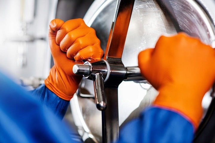 Pakke med orange GoGrip nitrilhandsker
